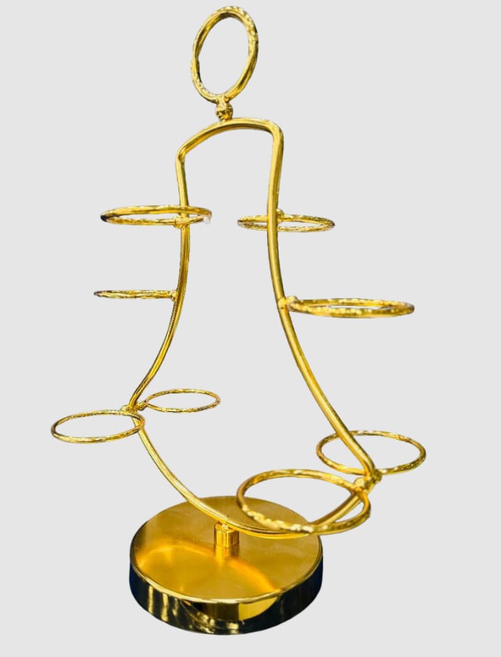 golden metal cup or glass holder stand